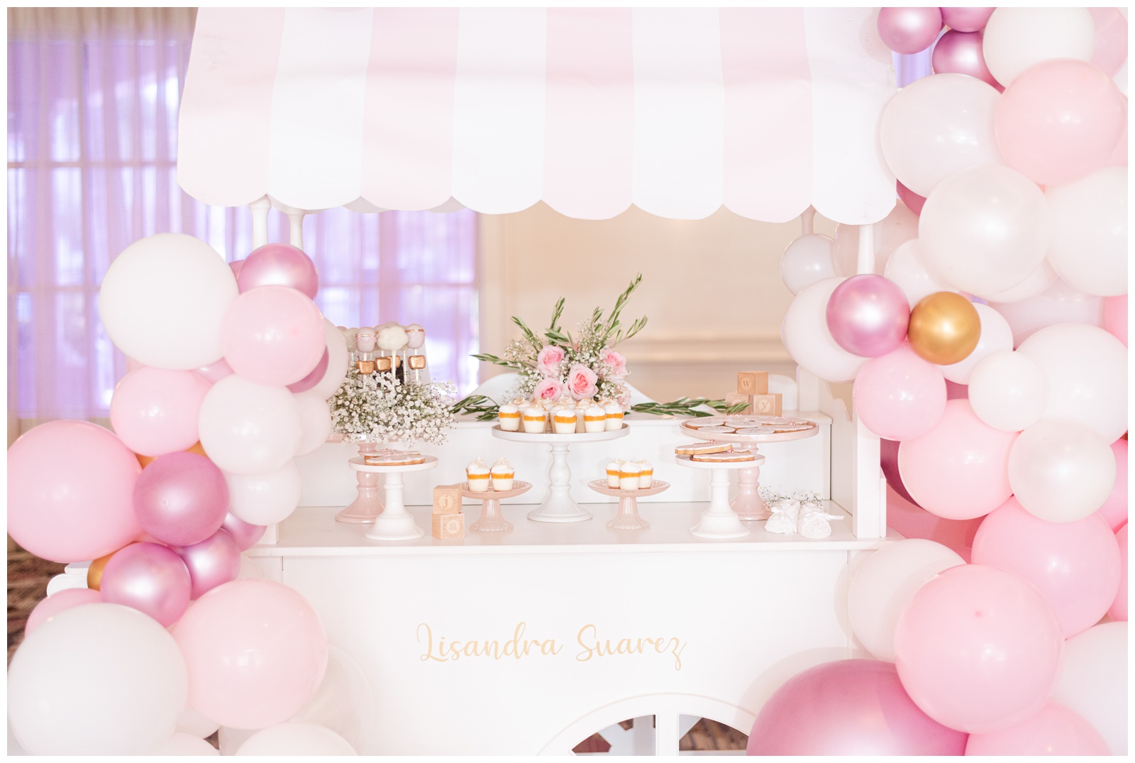 Pink White and Gold Dessert Cart Baby Shower with Balloon Garland