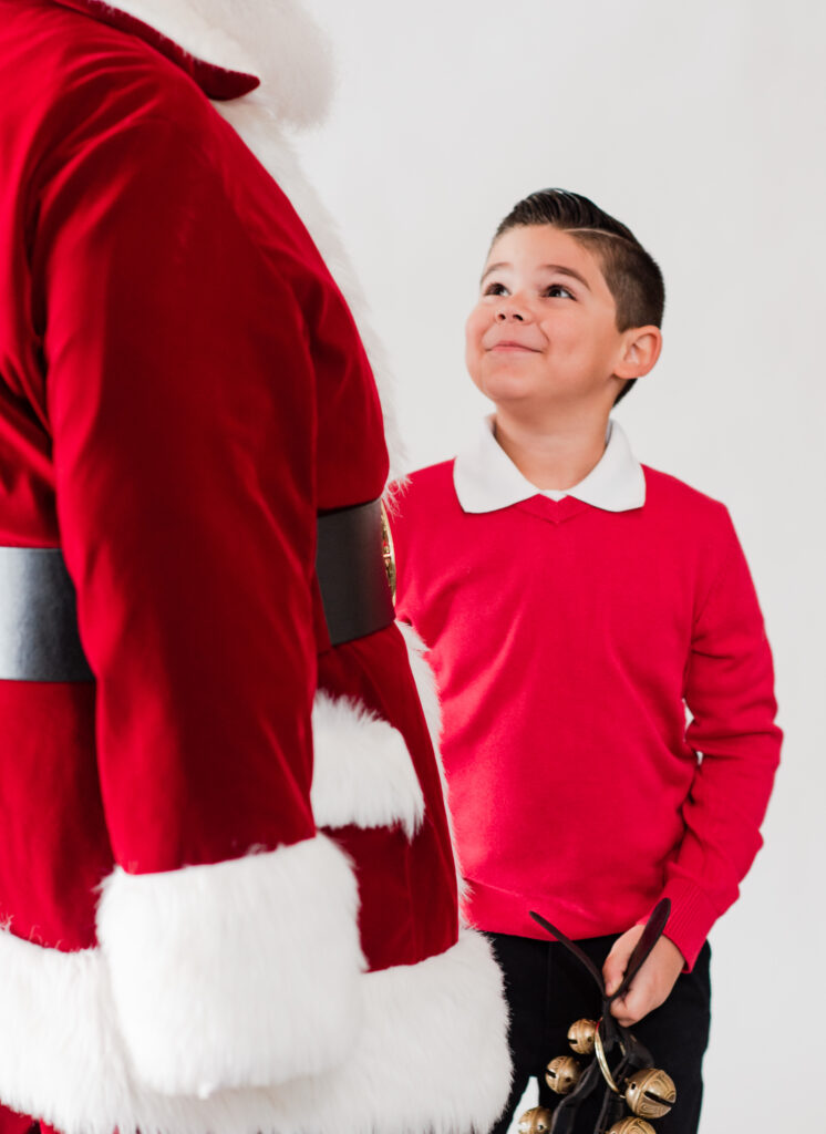 little boy seeing Santa